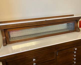 49 $650.00 Antique dental cabinet with original milk glass inserts 36x12 1/2 x54T