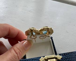 Large blue topaz earrings on 14kt gold setting, French backs. 10.8 grs. $800.