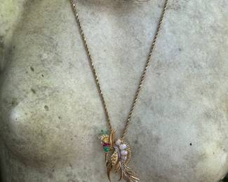 Extraordinary craftsmanship Crane 18kt gold brooch with Cabochon opal graduating size (5), 1 cabochon emerald and 5 natural emeralds with diamonds. weight 11.91 grams. Provenance from the Levin family - $1400 (chain not included)