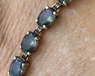 10kt white gold synthetic Alexandrite, size 7 1/2", 8.52 grams, $200