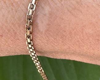 Bracelet 14kt yellow gold, 3 oval garnets, 7"long, 3.35 grams, $150.