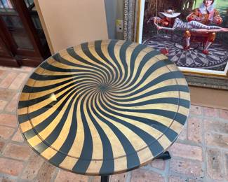 5 $90.00 Gold & black swirl table 23Dx29H