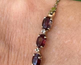 Bracelet 14kt yellow gold, 3 oval garnets, 7"long, 3.35 grams, $150.