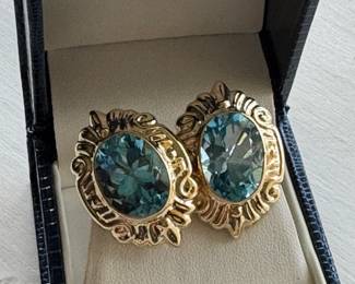 Large blue topaz earrings on 14kt gold setting, French backs. 10.8 grs. $800.