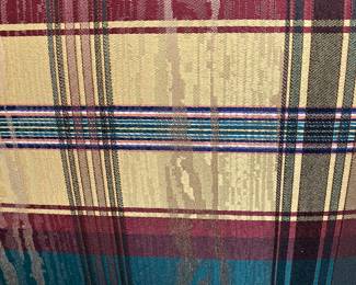 26 $120 each Pair of plaid wing back armchairs
