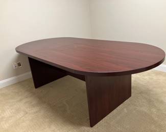 37 $220.00 Cherry oval stained laminate conference/ dining table 94Wx43Dx29H