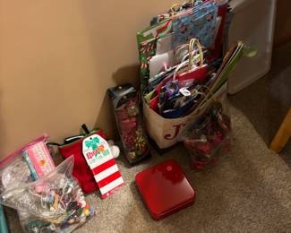 Christmas bags, Christmas crafting supplies, ribbons, crafting supplies, tins.