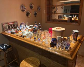 Glassware, European handmade mugs, signs, and souveniers.