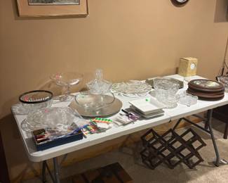 Fine crystal, paintings, sterling silver platters, and antiques.