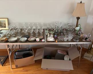 All items on this table are crystal and china, some gold plated. Tupperware and lamps.