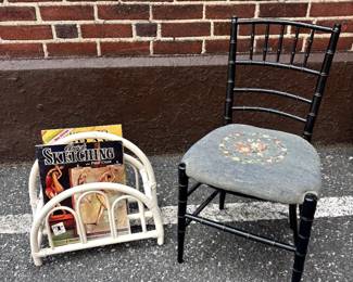 antique needlepoint chair and bamboo magazine rack