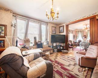 Family room with pocket doors to Parlour