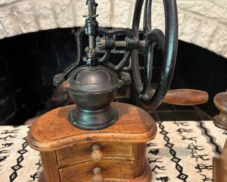 Antique hand-crank coffee grinder