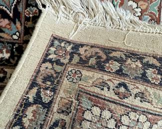 Reverse of hand knotted wool rug
