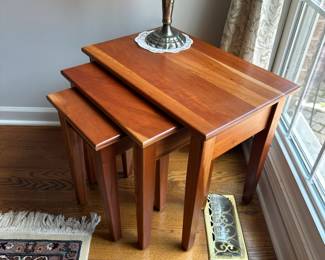 Beautiful solid wood nesting tables.