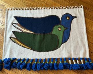Decorative wall hanging with metal accents