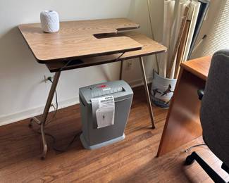 Sewing table and paper shredder.