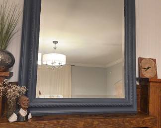 Large gray mantle beveled mirror $30 German clay grandpa, $15 Hammered vase with seagrass $10 mid Century clock $10