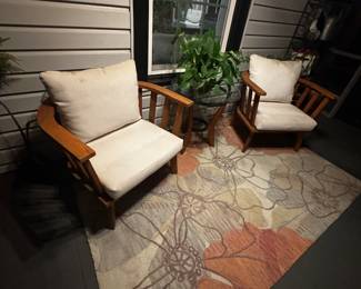 Two teak patio chairs $125 anthropology Rug inside outside $75