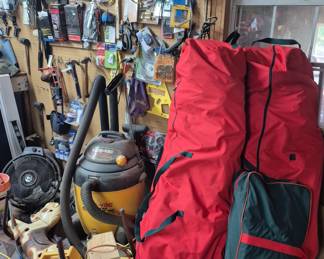 Tools hardware, Christmas trees in storage bags (on right)