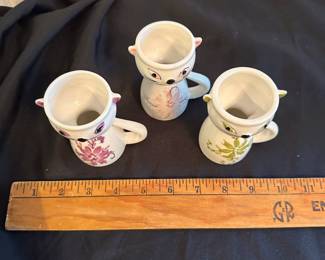 C28 - $40. Set of three Cat Egg cups from Portugal. Measures 3.75" Tall.