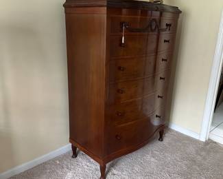 C3 - $450. Sheraton Style Serpentine Tall Chest of Drawers, has key, a few minor imperfections noted in pictures. Measures 40.5" Wide x 21" Deep x 59" Tall