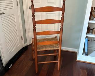 C87 - $60. Single Antique Caned Chair. Measures 19.5" wide x 16.5" deep x 44.5" tall.