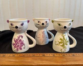 C28 - $40. Set of three Cat Egg cups from Portugal. Measures 3.75" Tall.