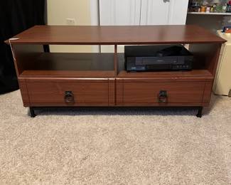C64 - $30. Media Stand. Measures 43" wide x 18" deep x 18" tall.