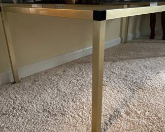 C77- $50. Very Sturdy, Large Acrylic Marbled top Coffee Table with brass frame (designed to look like stone - easier to move!) Measures 55.25" wide x 27.5" deep x 20.5" tall.