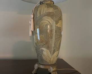 C37 - $40. Beautiful Ceramic Cherub Lamp. Measures 31.5" tall. Shade is in very good condition.