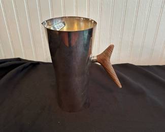 C11 - $65. Carl Christensen Pitcher With Rosewood Handle. Measures 8.5" Tall.