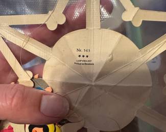 C69 - $15. Hand cut Danish Christmas mobile.