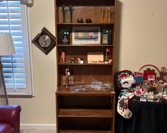 C48- $150. Ethan Allen Book Case. Measures 30.5" Wide x 14" Deep x 78" Tall. Moves in 2 pieces.