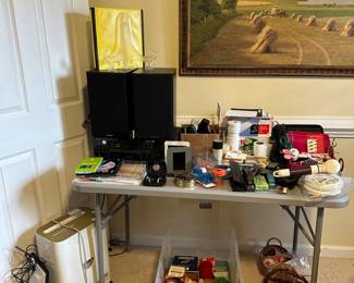 C66 - Over view of electronics and office supplies all individually priced.