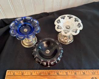 C26 - $60. Set of three Cut Glass Compote dishes on silver plated bases.