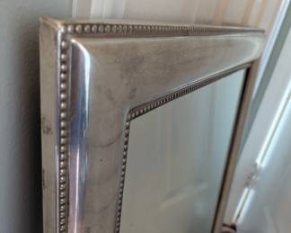 C107 - $30. Silver Framed Heavy Wall Mirror. (Can be hung vertically or horizontally.) Measures 22.5" wide x 29.5" tall.