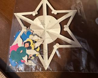 C69 - $15. Hand cut Danish Christmas mobile.