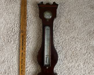 C78 - $125. Banjo Style 1800's Weather Station by D. Ortelli. Measures 12" wide x 42" tall. Top piece is broken - see photos.