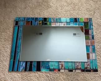 C76 - $40. Heavy Glass Mosaic Style Mirror. Measures 35" wide x 24" tall.