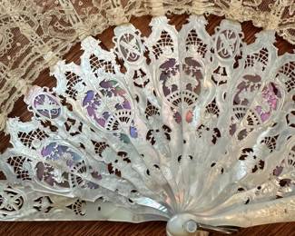 C63 - $150. Beautiful Mother of Pearl and Lace Hand fan. Suitable for framing. Does have a monogram in the lace. "FLS"