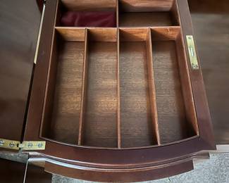 C42 - $250. Vanity & Mirror with sticker saying "Roskilde". (Probably made in Roskilde, Denmark.) Each side has a top that lifts up for jewelry storage. One door is open storage - one is drawers. Measures 50.25" wide x 20.5" deep x 33" tall. Mirror measures 37.5" tall and just screws onto the back. Decorative piece, between the legs, on the bottom right is missing. Less noticeable if its near a piece of furniture / bed.