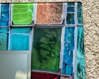 C76 - $40. Heavy Glass Mosaic Style Mirror. Measures 35" wide x 24" tall.