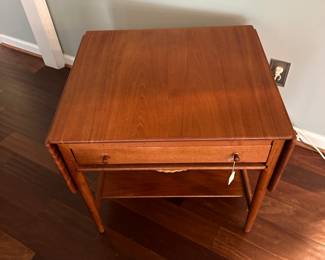 C88 - $850. 1950's Sewing Table AT-33 Hans Wegnar (by Anders Tuck) Minor imperfection noted in the picture. Measures 25.5" wide x 22.5" deep x 24" tall. Two Drop leaves are each 10.75" wide.