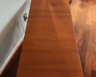 C88 - $850. 1950's Sewing Table AT-33 Hans Wegnar (by Anders Tuck) Minor imperfection noted in the picture. Measures 25.5" wide x 22.5" deep x 24" tall. Two Drop leaves are each 10.75" wide.