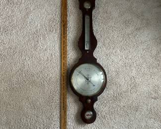 C78 - $125. Banjo Style 1800's Weather Station by D. Ortelli. Measures 12" wide x 42" tall. Top piece is broken - see photos.