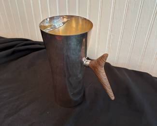 C11 - $65. Carl Christensen Pitcher With Rosewood Handle. Measures 8.5" Tall.