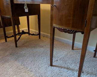 C42 - $250. Vanity & Mirror with sticker saying "Roskilde". (Probably made in Roskilde, Denmark.) Each side has a top that lifts up for jewelry storage. One door is open storage - one is drawers. Measures 50.25" wide x 20.5" deep x 33" tall. Mirror measures 37.5" tall and just screws onto the back. Decorative piece, between the legs, on the bottom right is missing. Less noticeable if its near a piece of furniture / bed.