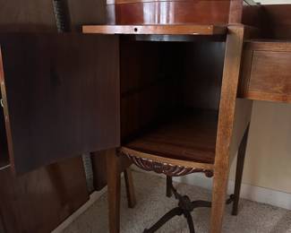 C42 - $250. Vanity & Mirror with sticker saying "Roskilde". (Probably made in Roskilde, Denmark.) Each side has a top that lifts up for jewelry storage. One door is open storage - one is drawers. Measures 50.25" wide x 20.5" deep x 33" tall. Mirror measures 37.5" tall and just screws onto the back. Decorative piece, between the legs, on the bottom right is missing. Less noticeable if its near a piece of furniture / bed.