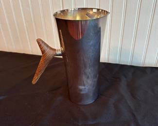 C11 - $65. Carl Christensen Pitcher With Rosewood Handle. Measures 8.5" Tall.